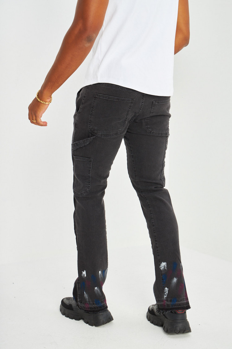 Jeans coupe droite noir avec taches de peinture