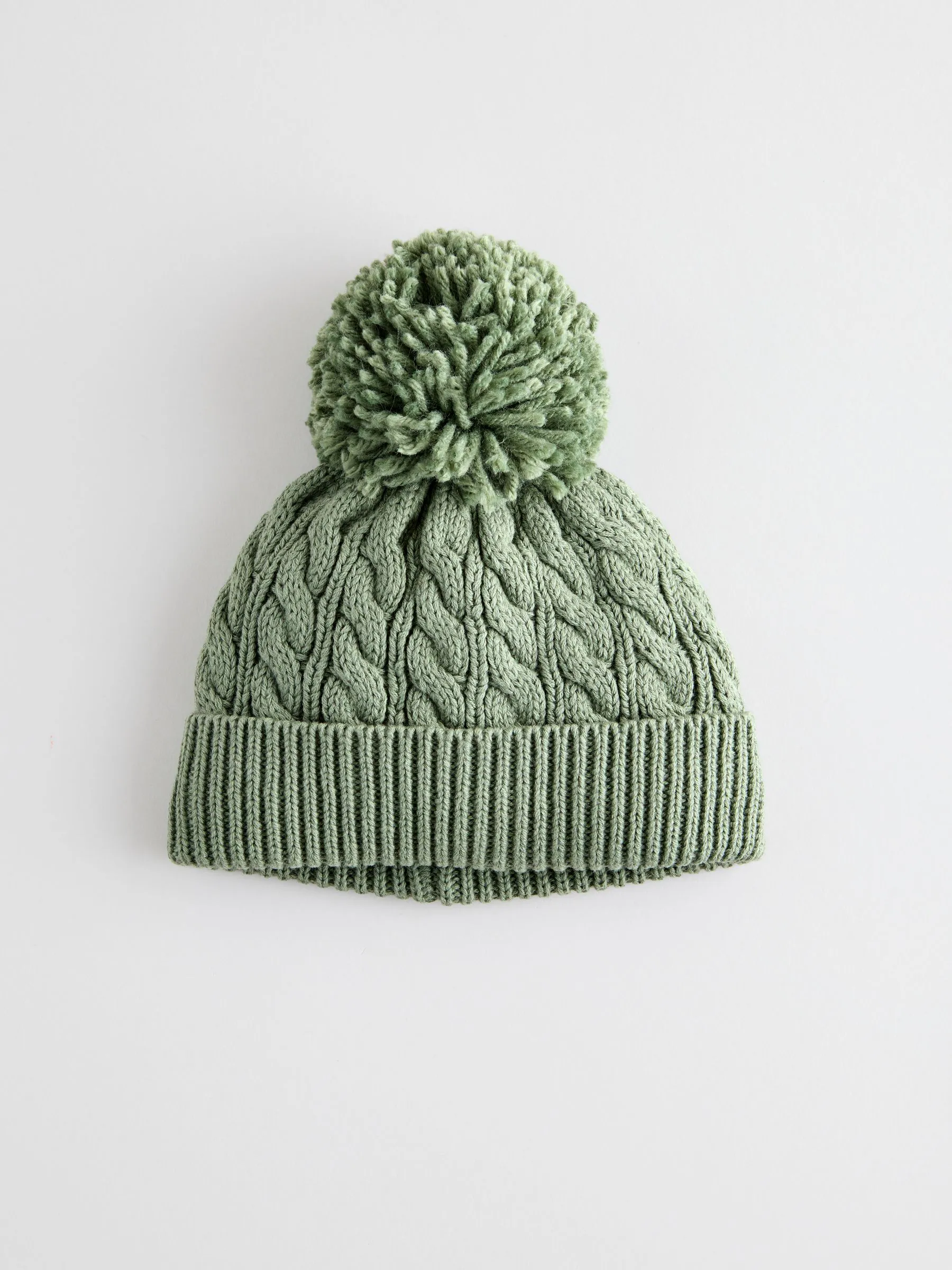 Groen - Gebreide Baby muts met pompon (0mnd -2jr)