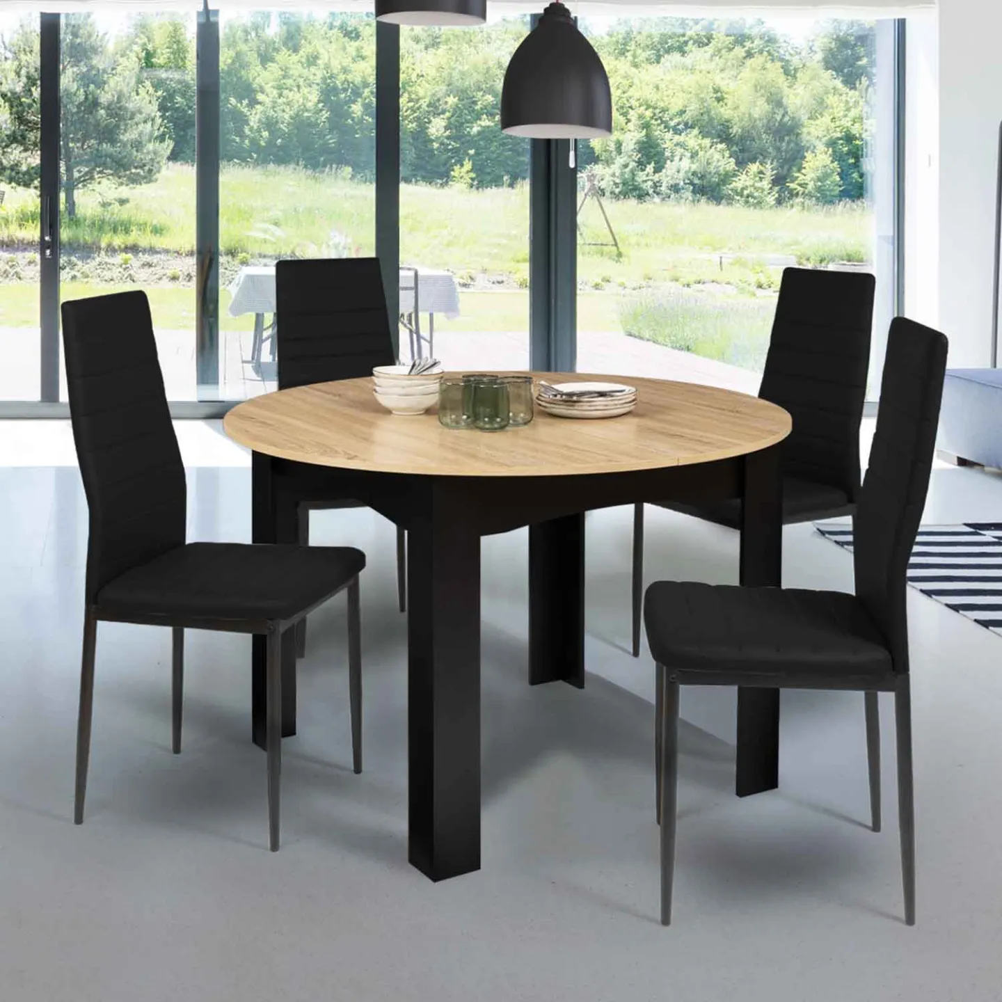 Table à manger extensible ronde DONA 4-8 personnes noire plateau façon hêtre 110-150 cm