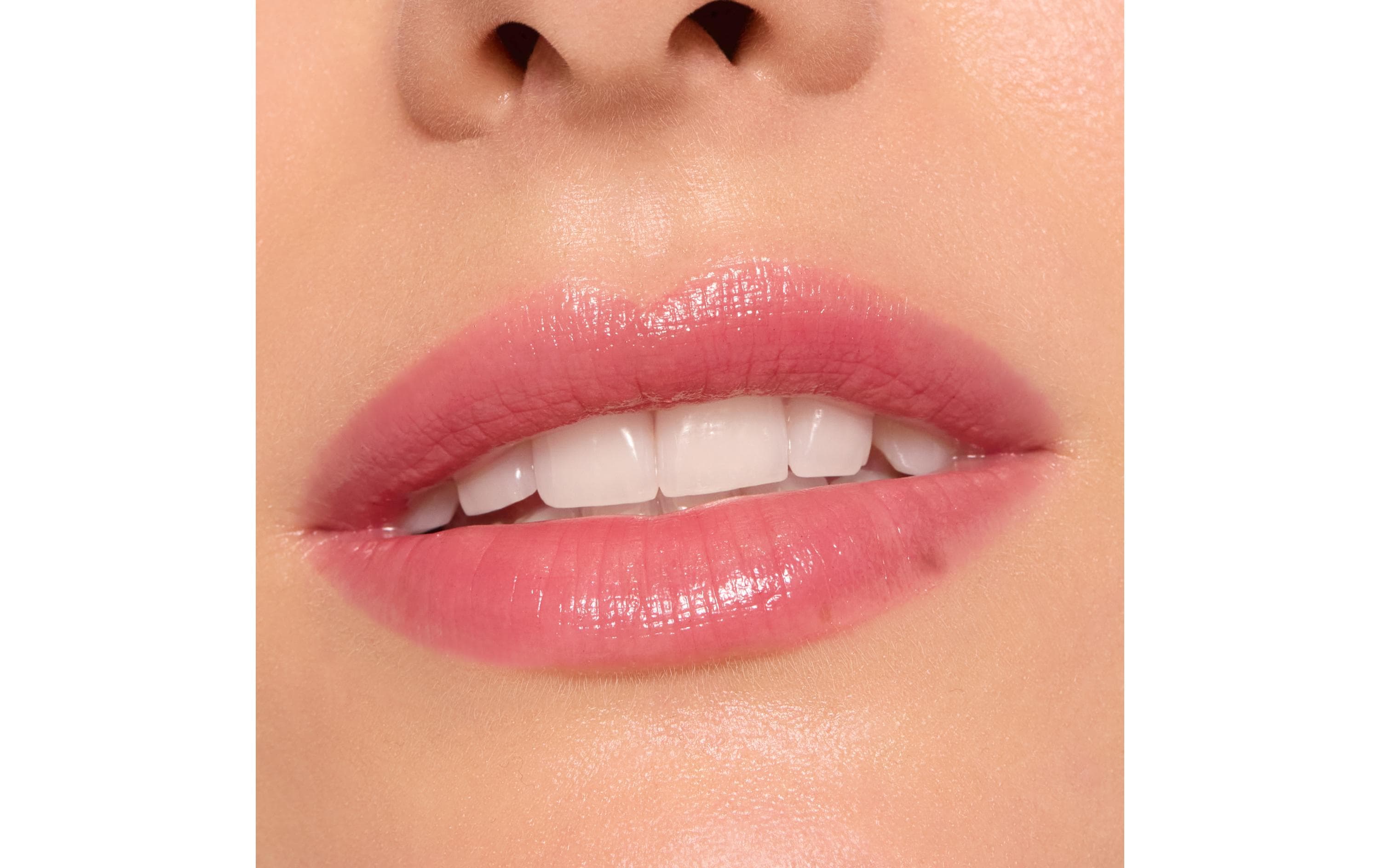 Lip Gloss Care In Colours 040 Hot TakeFarbiger Lippenbalsam in einem kühlen Rotton für glänzende Lippen