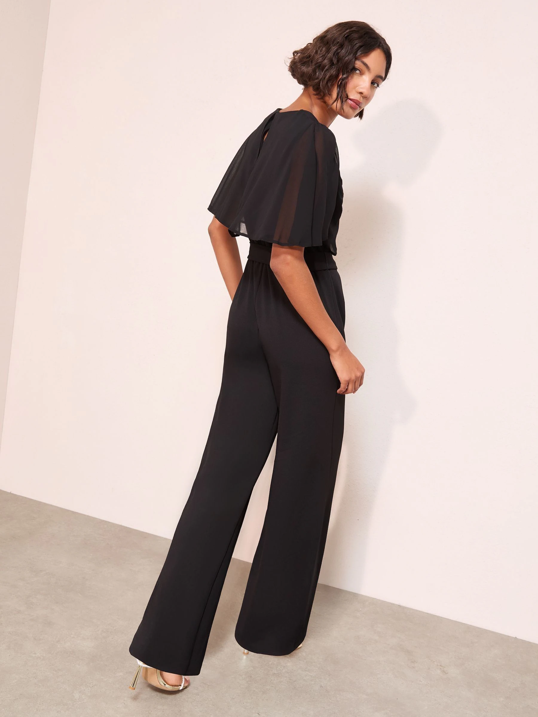 Zwart - Friends Like These Scuba Jumpsuit With Chiffon Overlay