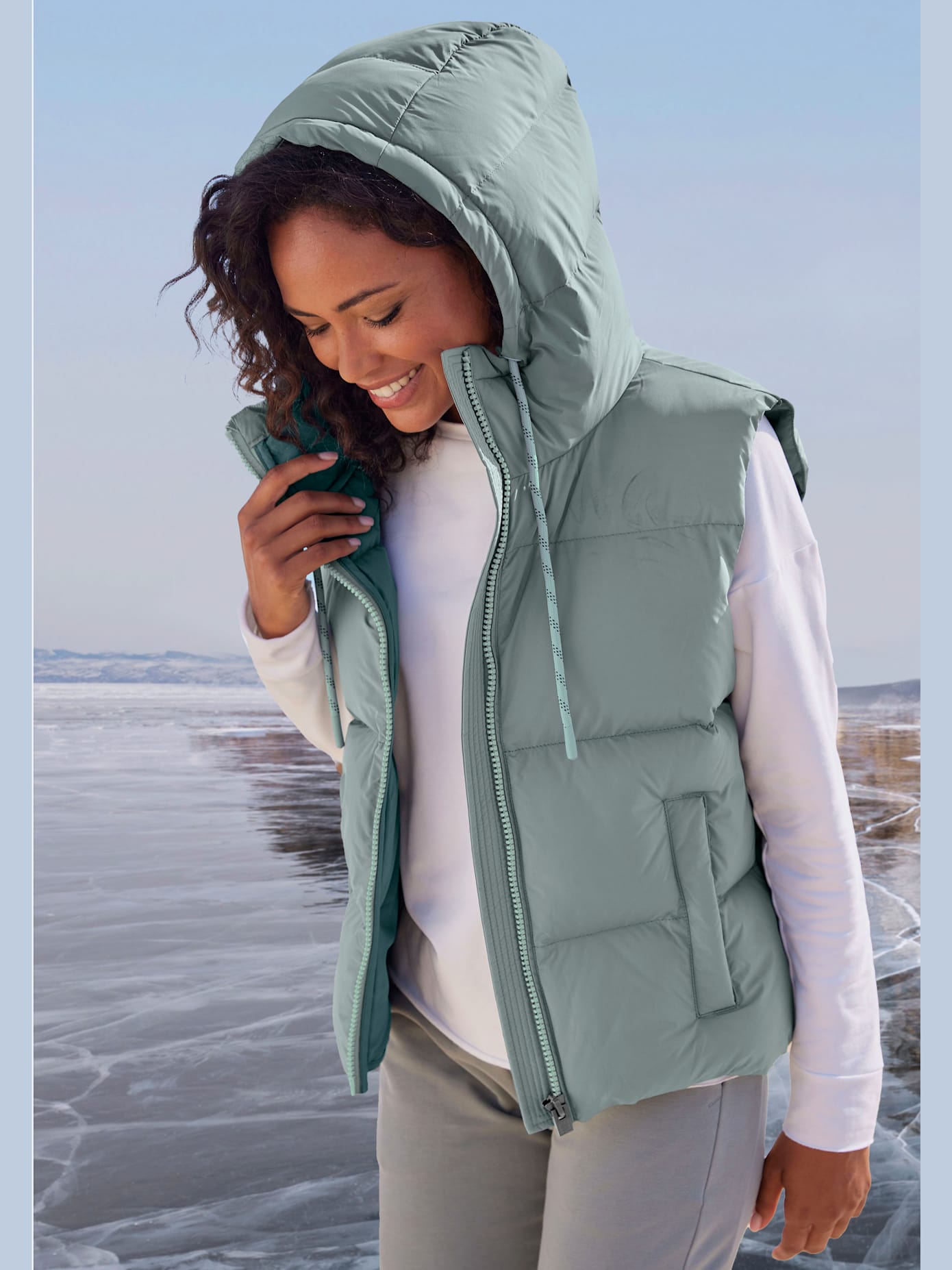 Gilet matelassé doublé avec capuche réglable