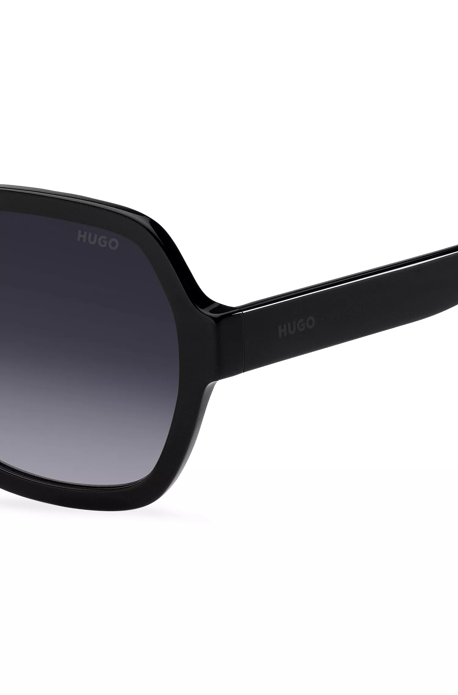 Óculos de sol HUGO em acetato vermelho e preto com detalhes do logotipo.