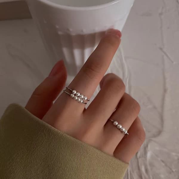 INF Justerbar antistressring med roterbare perler Sølv S