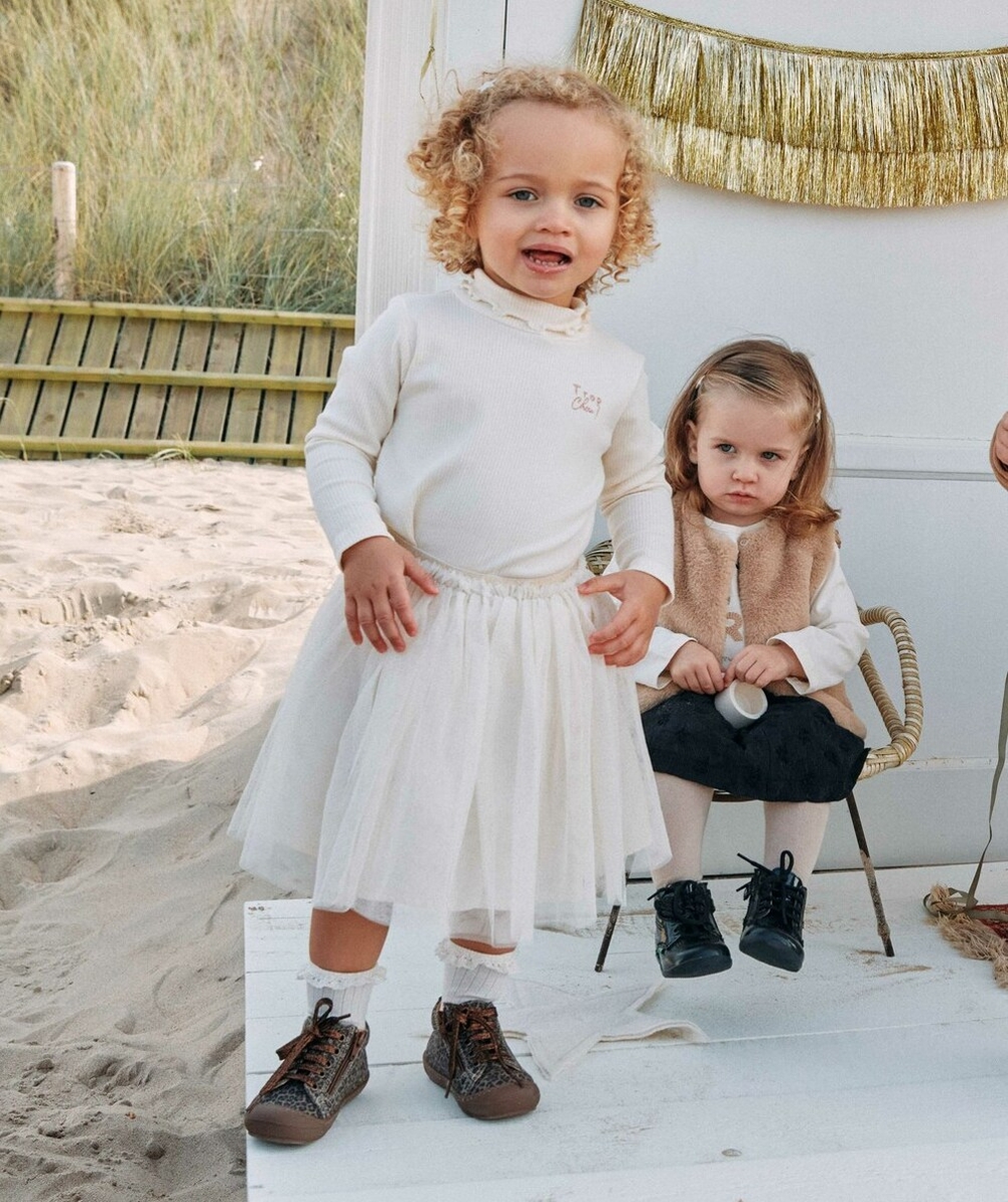 JUPE COURTE ET TOUNANTE EN TULLE AVEC POIS COULEUR DORÉE BÉBÉ FILLE