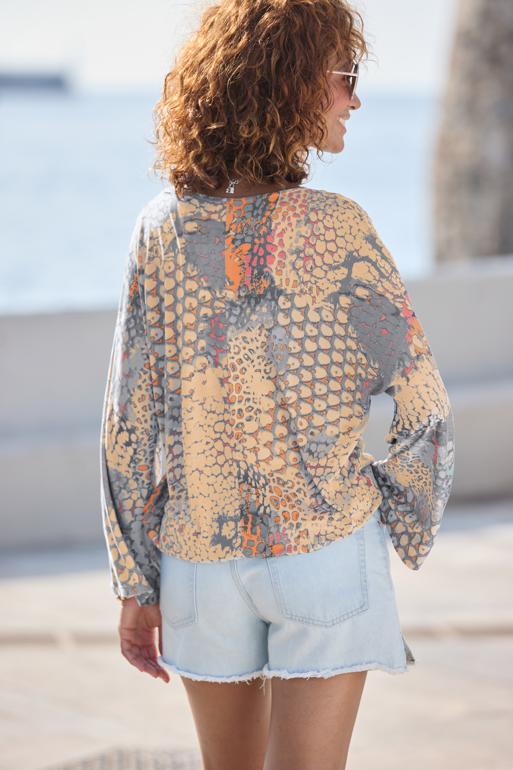Buffalo Fledermausshirt , mit Animaldruck, lockere Bluse mit V-Ausschnitt, Blusenshirt