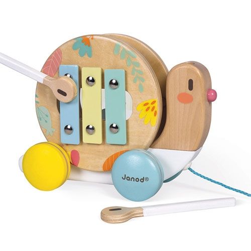 Janod trekfiguur en muziekinstrument slak