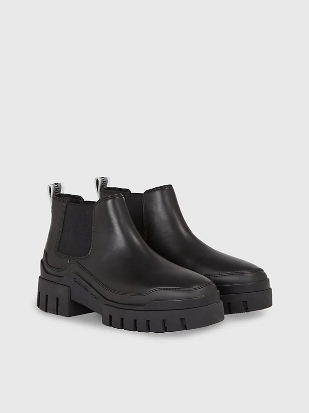 botas de couro até o tornozelo