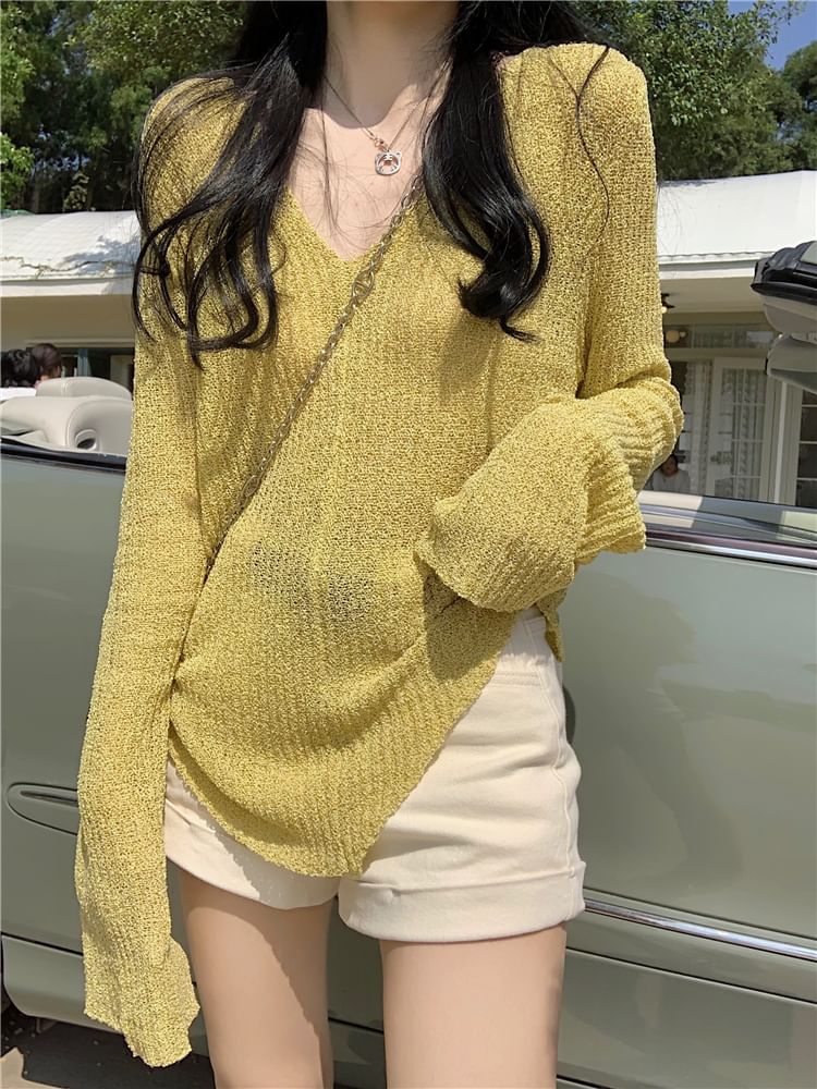 Shinsei - Asymmetrisch gebreide top met lange mouwen en V-hals