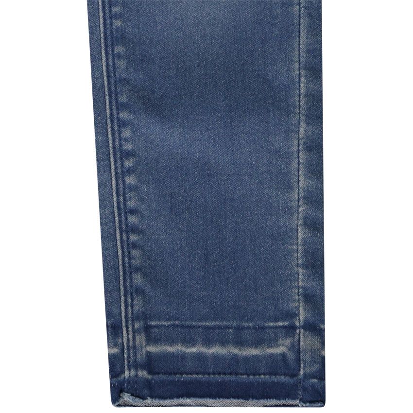 Jean slim à rivets effet délavé pour fille - Bleu moyen