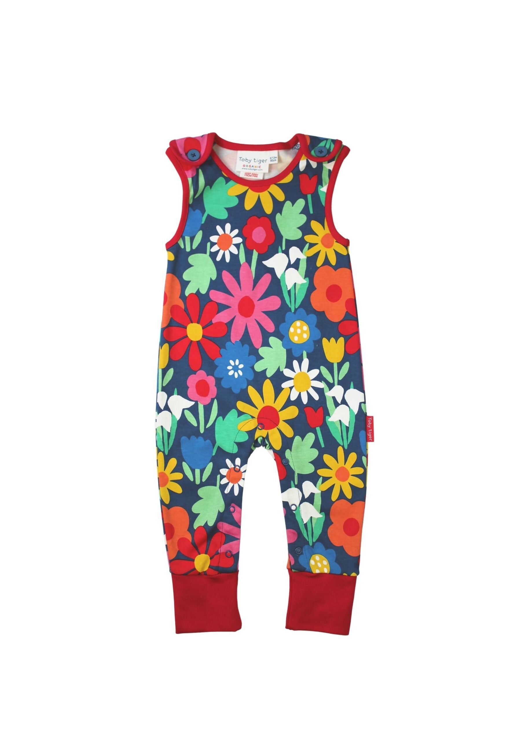 Toby Tiger Strampler mit auffälligem Blumenmuster