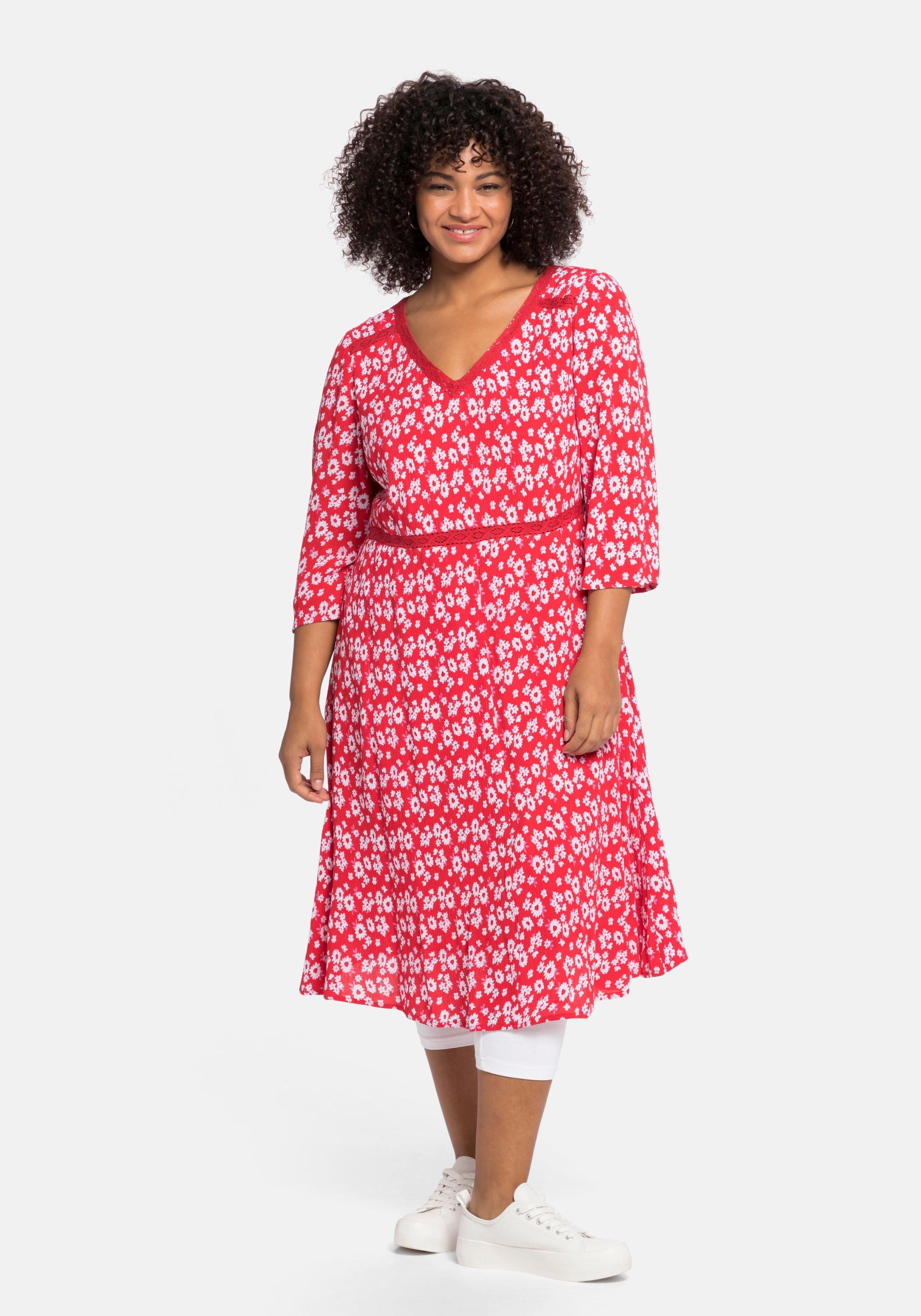Kleid mit Blumendruck und Spitzenbesatz