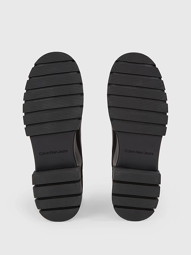 botas de couro até o tornozelo