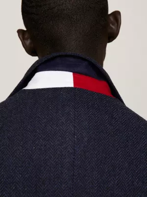 Blazer de lã com trama espinha de peixe e corte slim.