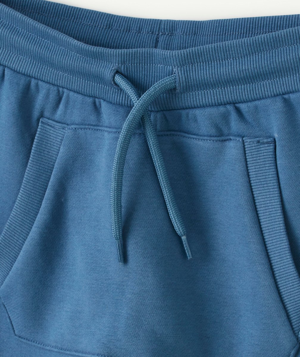 JOGGING GARÇON EN FIBRES RECYCLÉES BLEU AVEC POCHE KANGOUROU