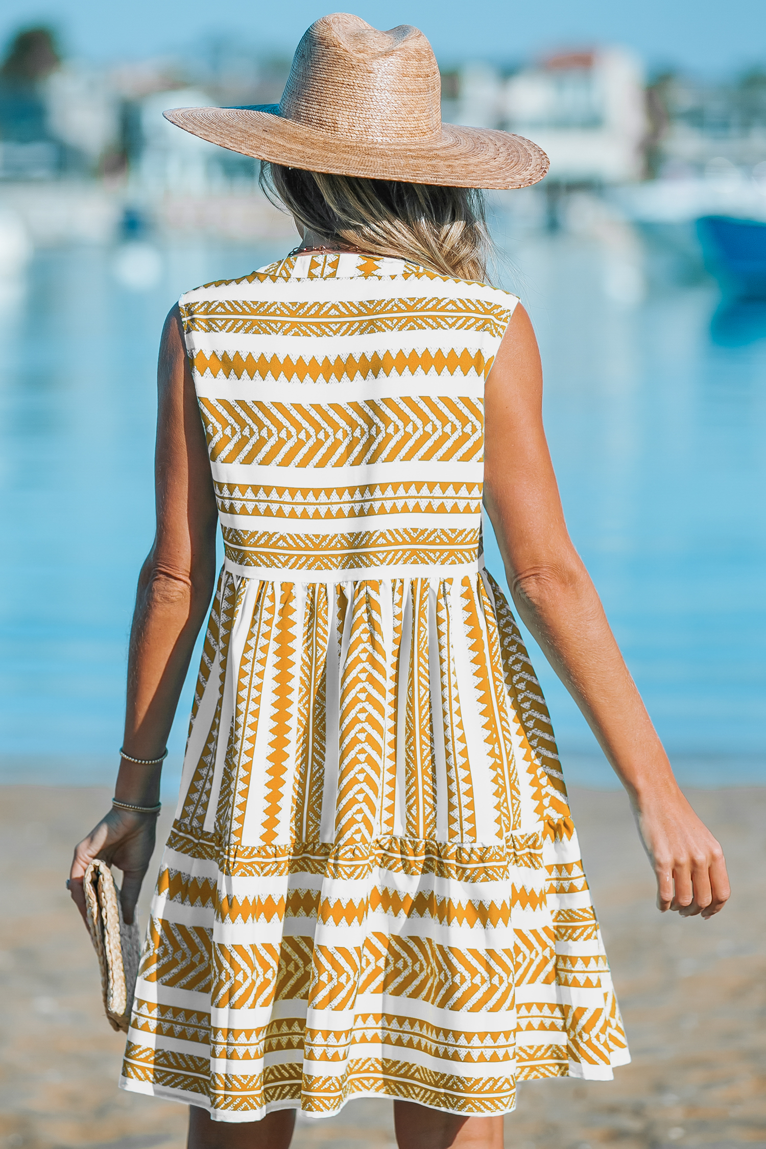 Robe mini sans manches à rayures géométriques jaune et blanche