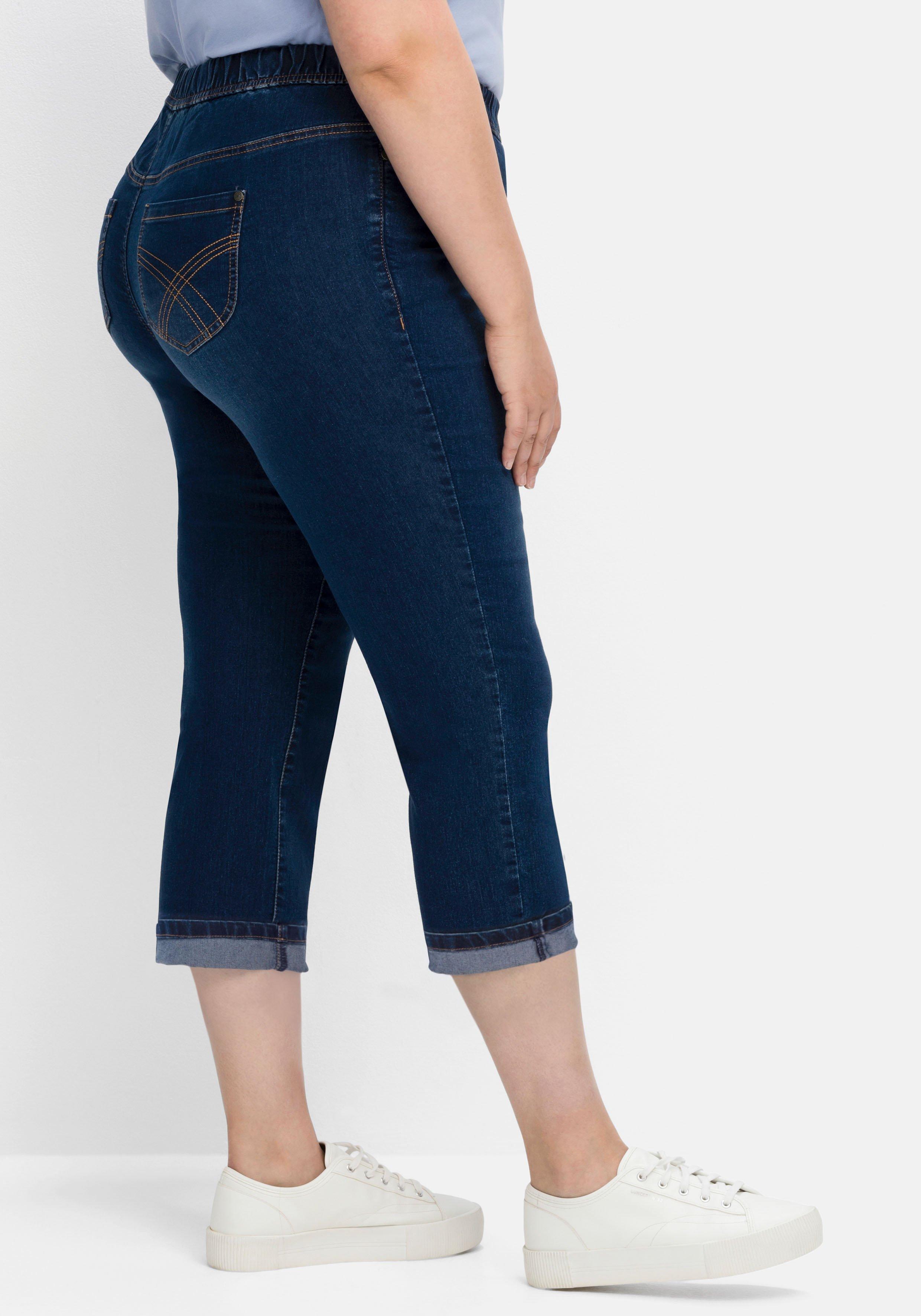 Schmale Caprijeans mit Saumumschlag