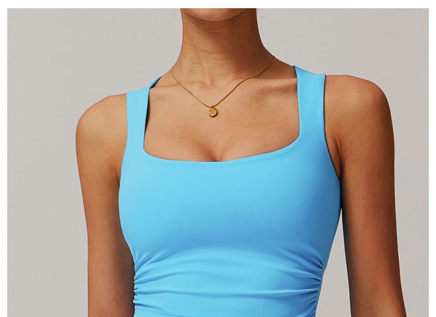 Skinniano - Sporttop met vierkante hals en effen crop top