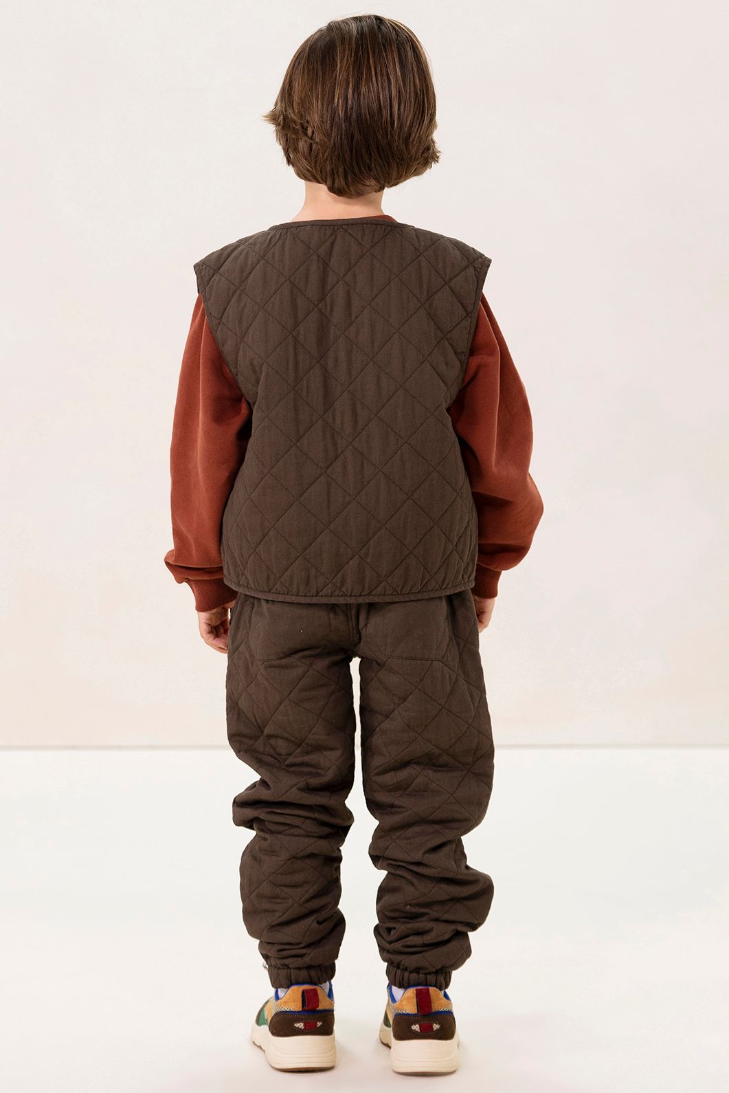 Donkergroen quilted gilet
