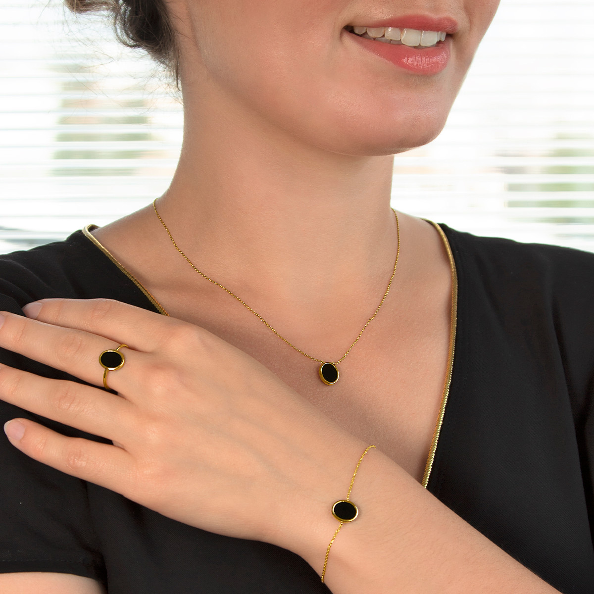 Bracelet or 750 jaune onyx ovale 18.5 cm