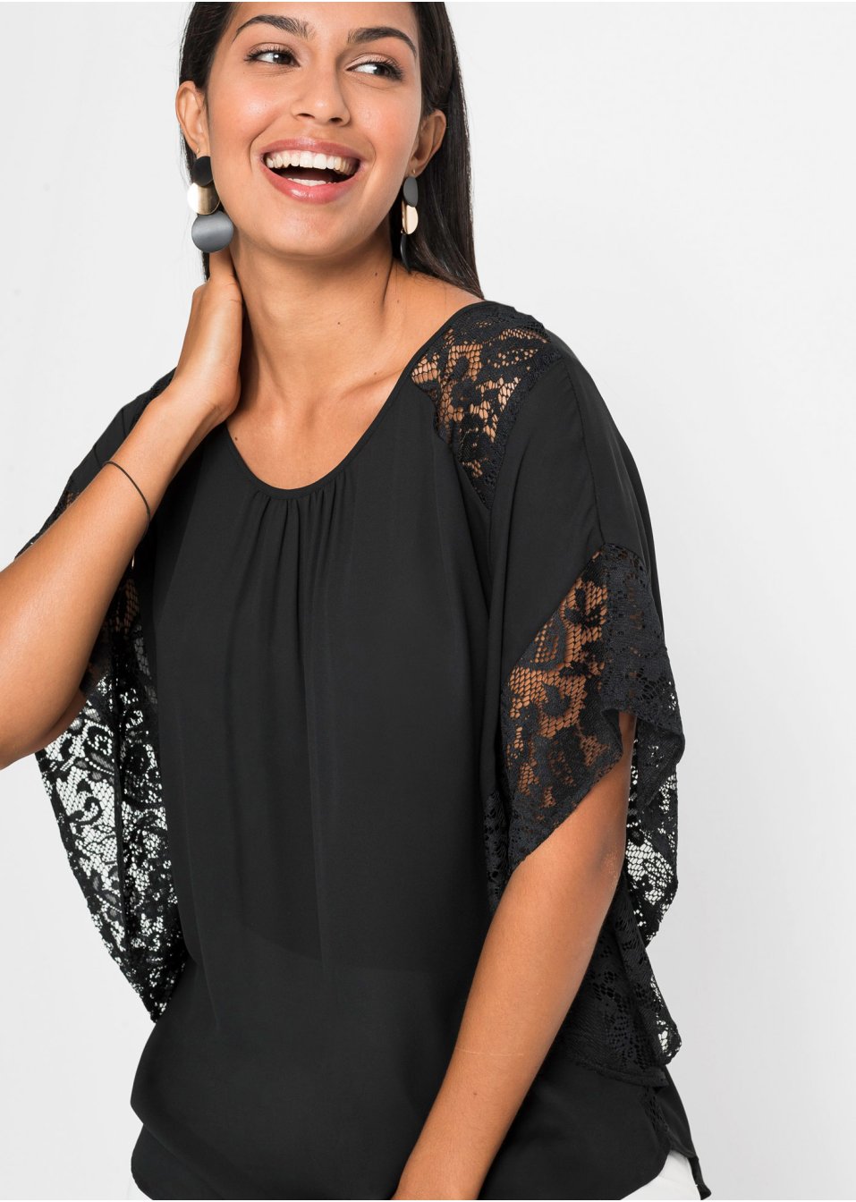 Blouse avec détails en dentelle