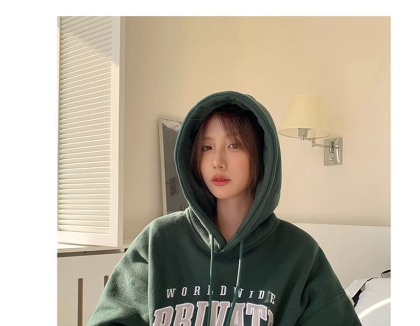 Alfie - Oversized hoodie met pofmouw en letters