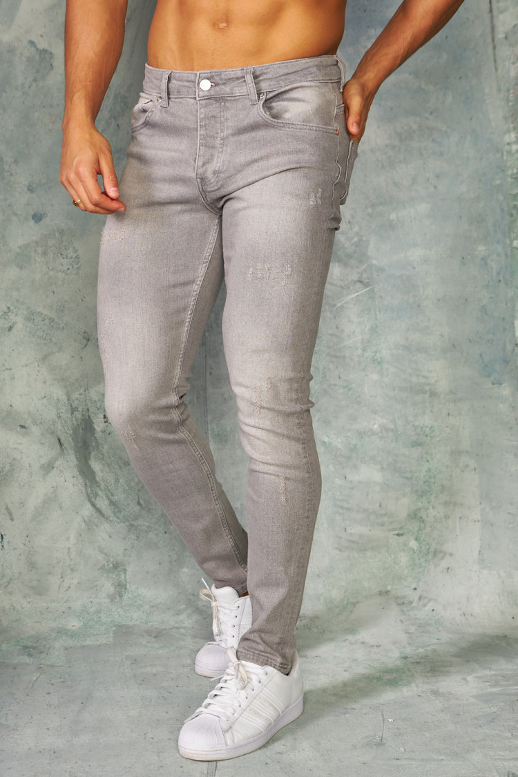 Jeans slim gris griffé