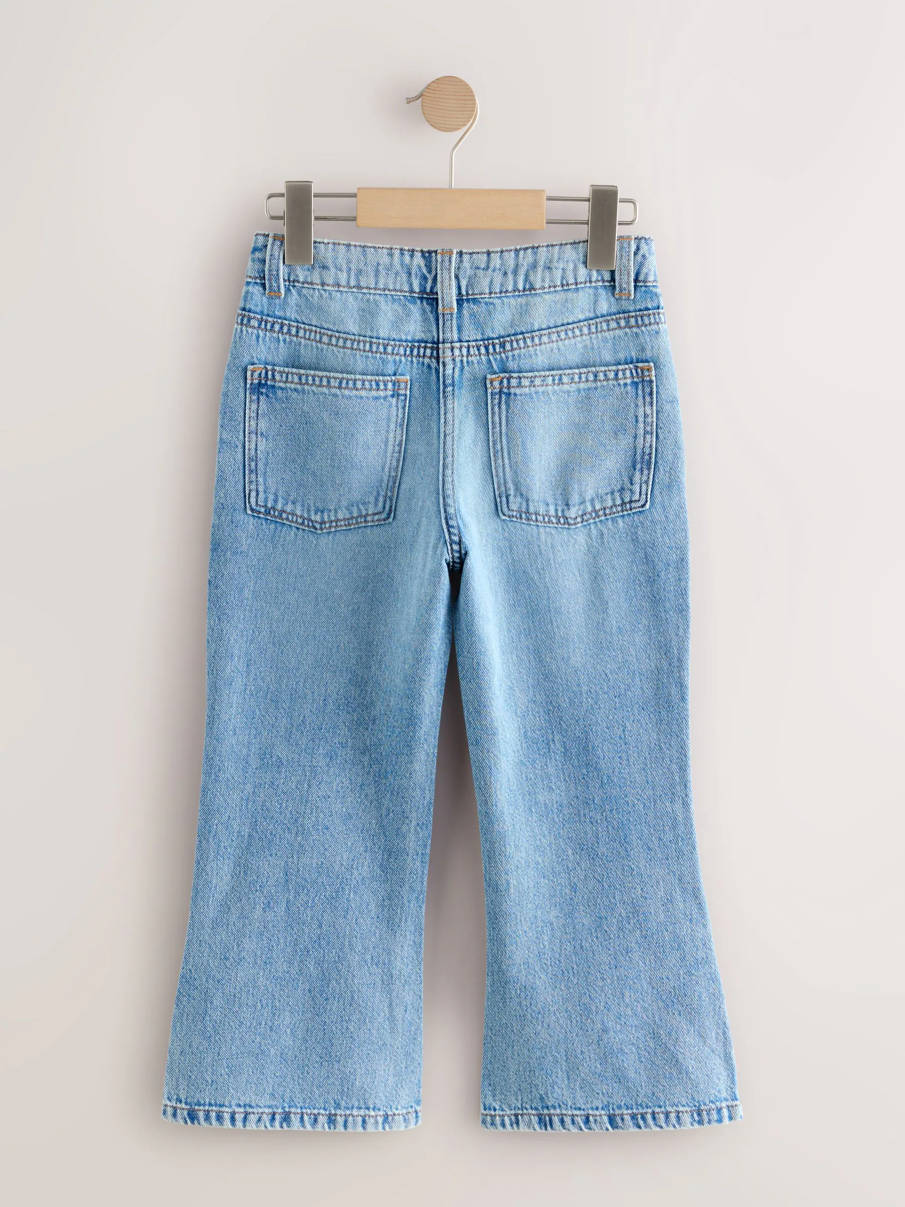 Lichtblauwe denim - Flare jeans met bloemenversiering (3-16jaar)