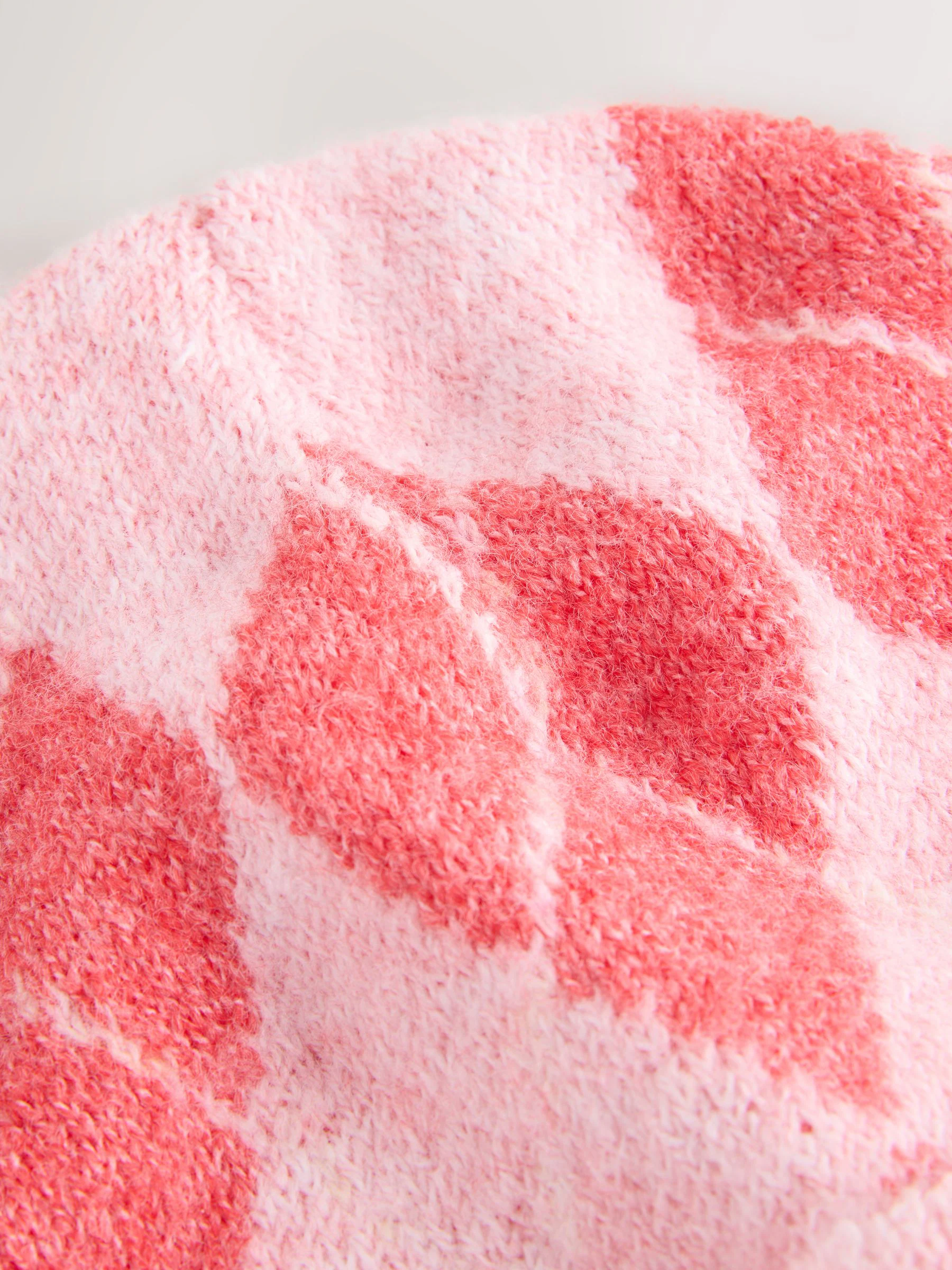 Rood/roze met ajourmotief - Gebreide beanie