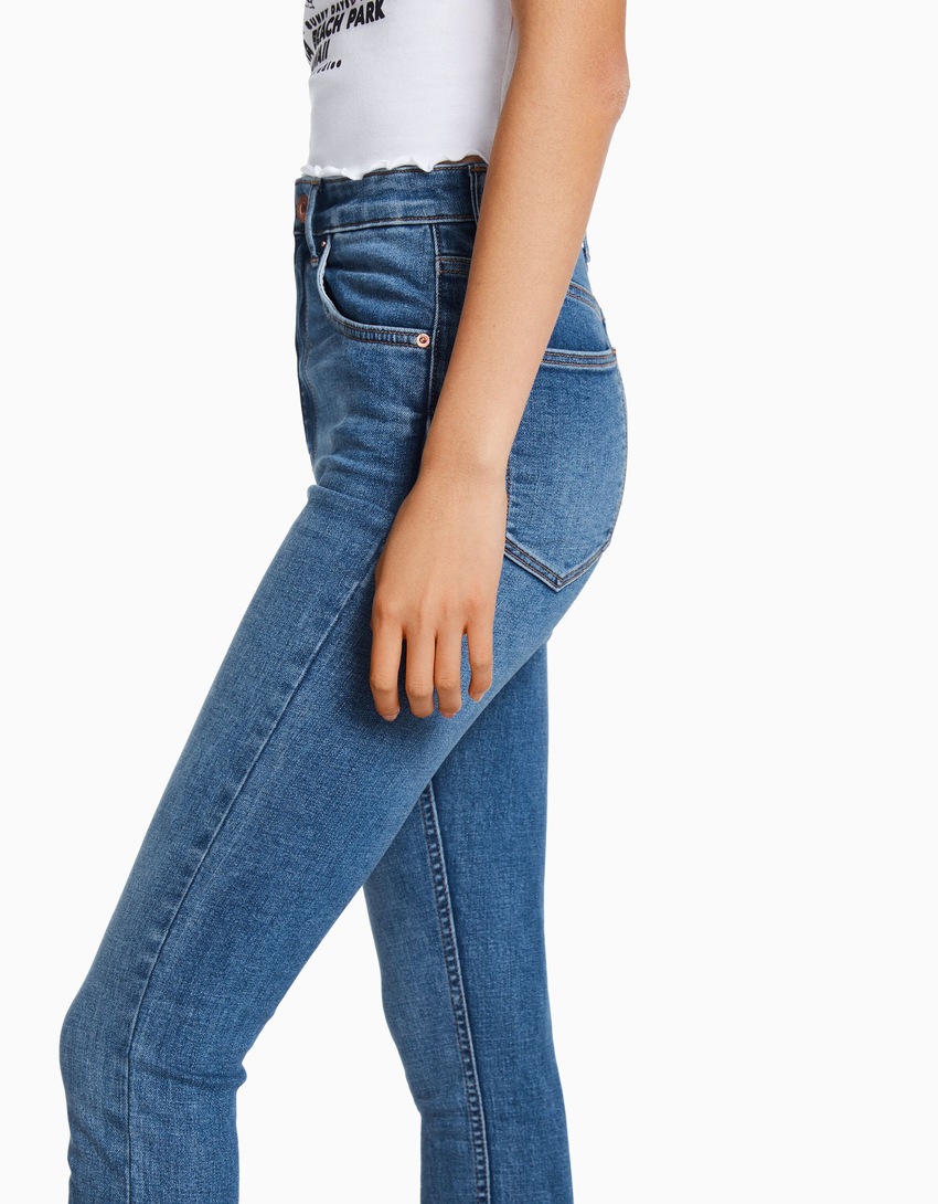 calça jeans skinny de cintura super alta