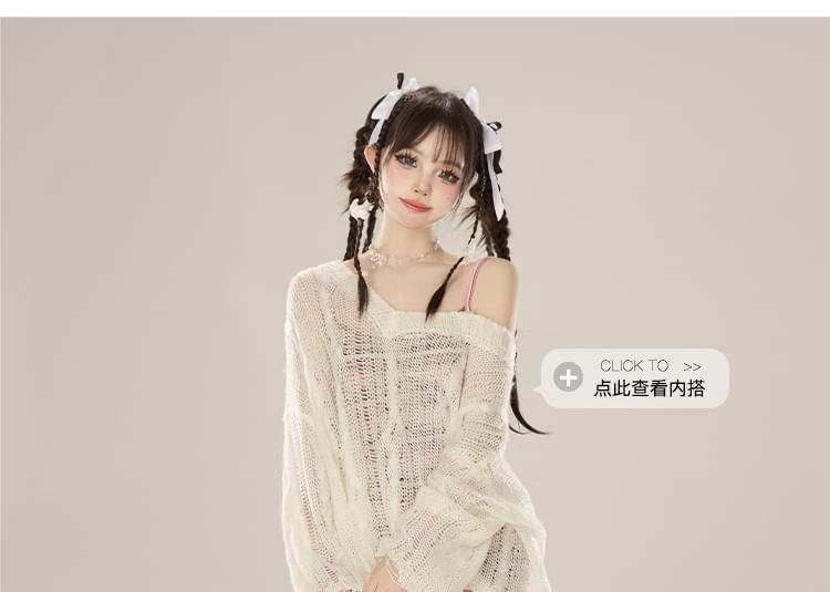 KUMI - Lange mouwen, effen gebreide top met distressed effect
