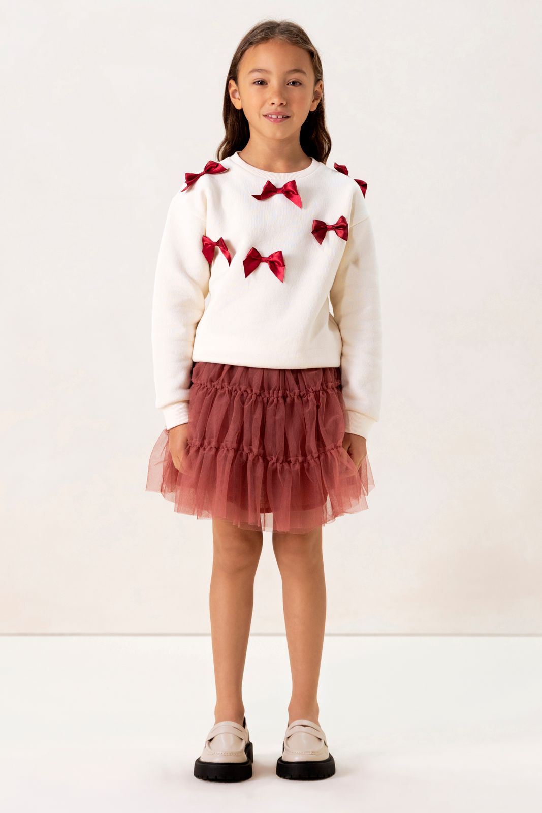 Witte sweater met strikjes