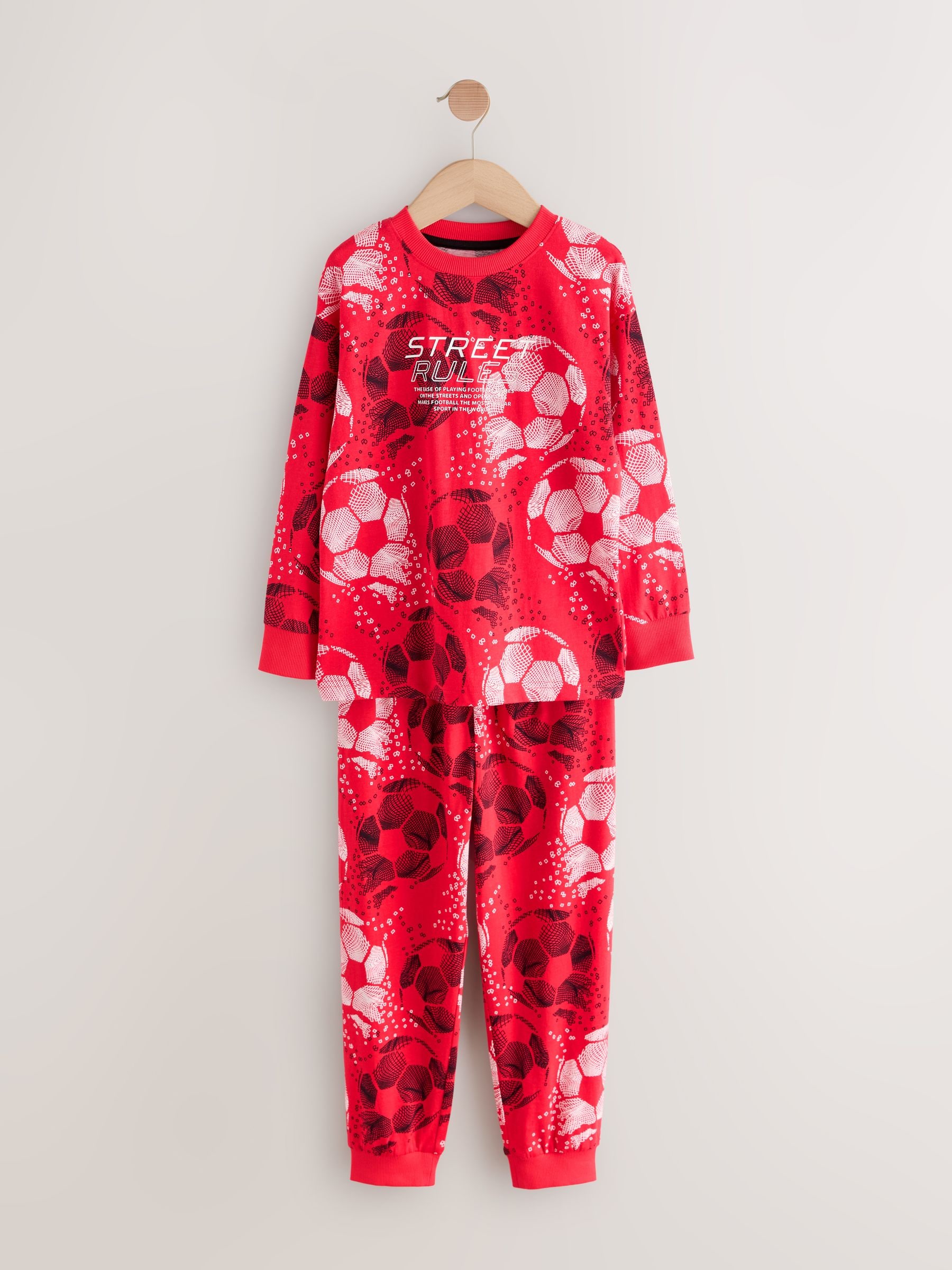 Rood/zwart voetbal  - Verpakking van 2 pyjama's met lange mouwen (3-16 jr)