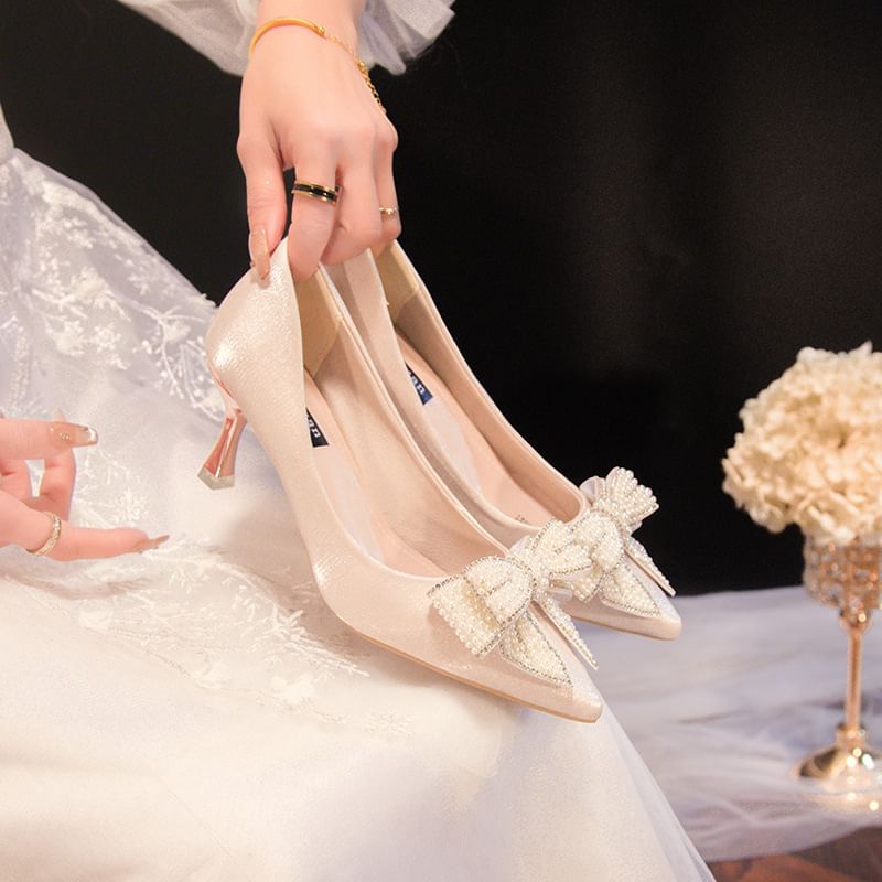 Silverslyre - Pumps met puntige neus en strik van imitatieparels en strass