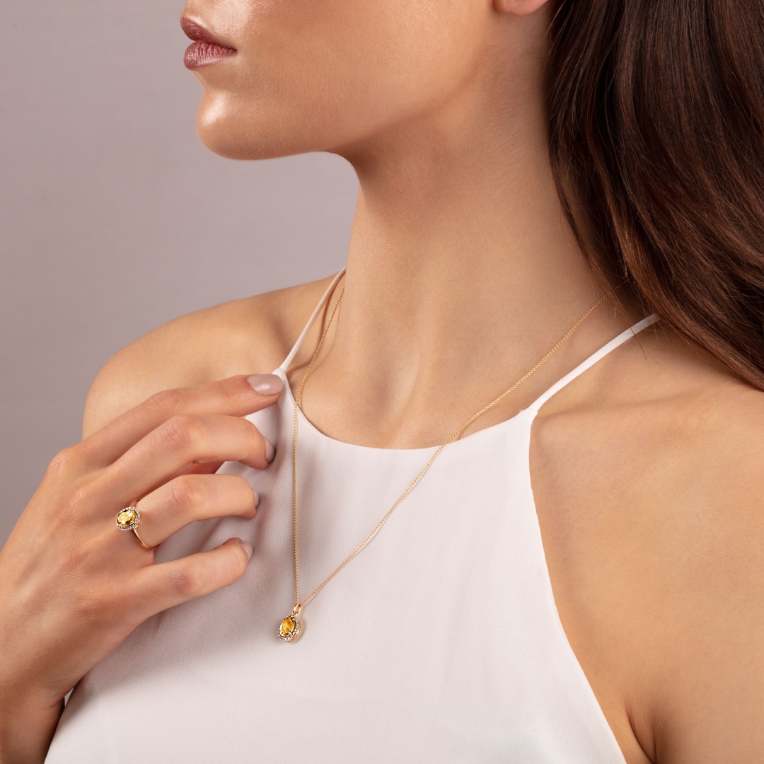 Anhänger 750/18 K Gelbgold mit Citrin oval und Diamanten 0.06 ct H/si