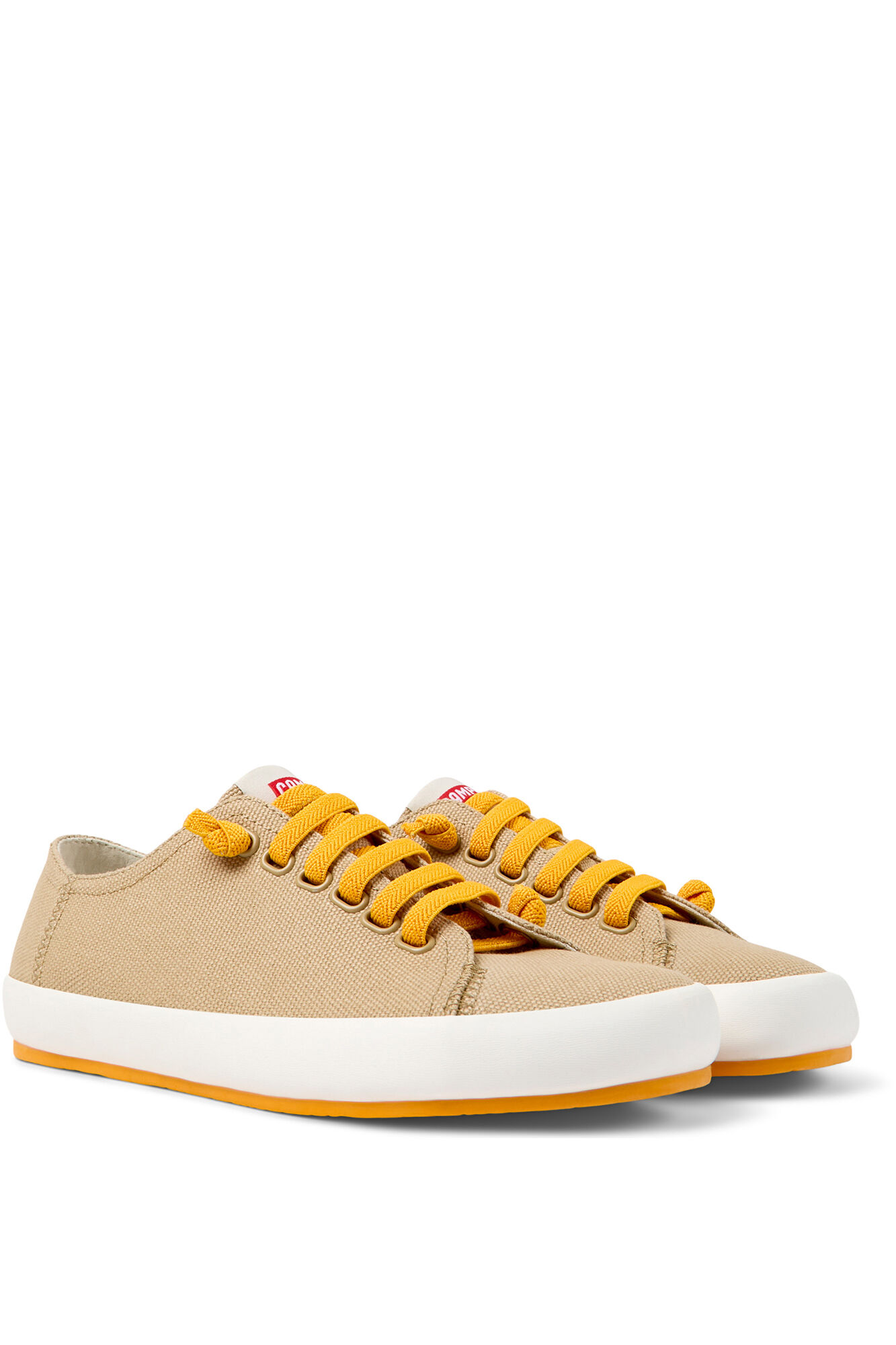 Tênis feminino amarelo trançado. - bege