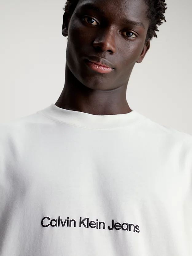 Camiseta de corte folgado com logotipo nas costas