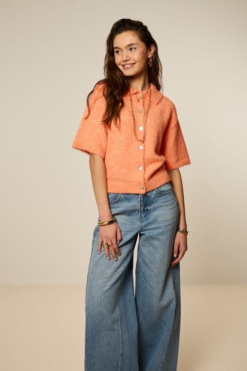 Oranje polo vest met korte mouwen