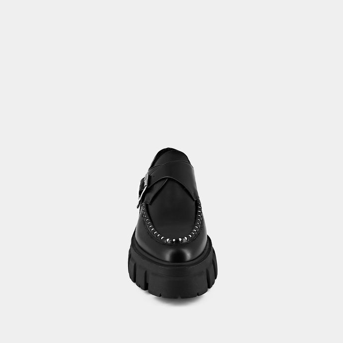 Mocassins à semelles crantées et détails...  en cuir glacé noir