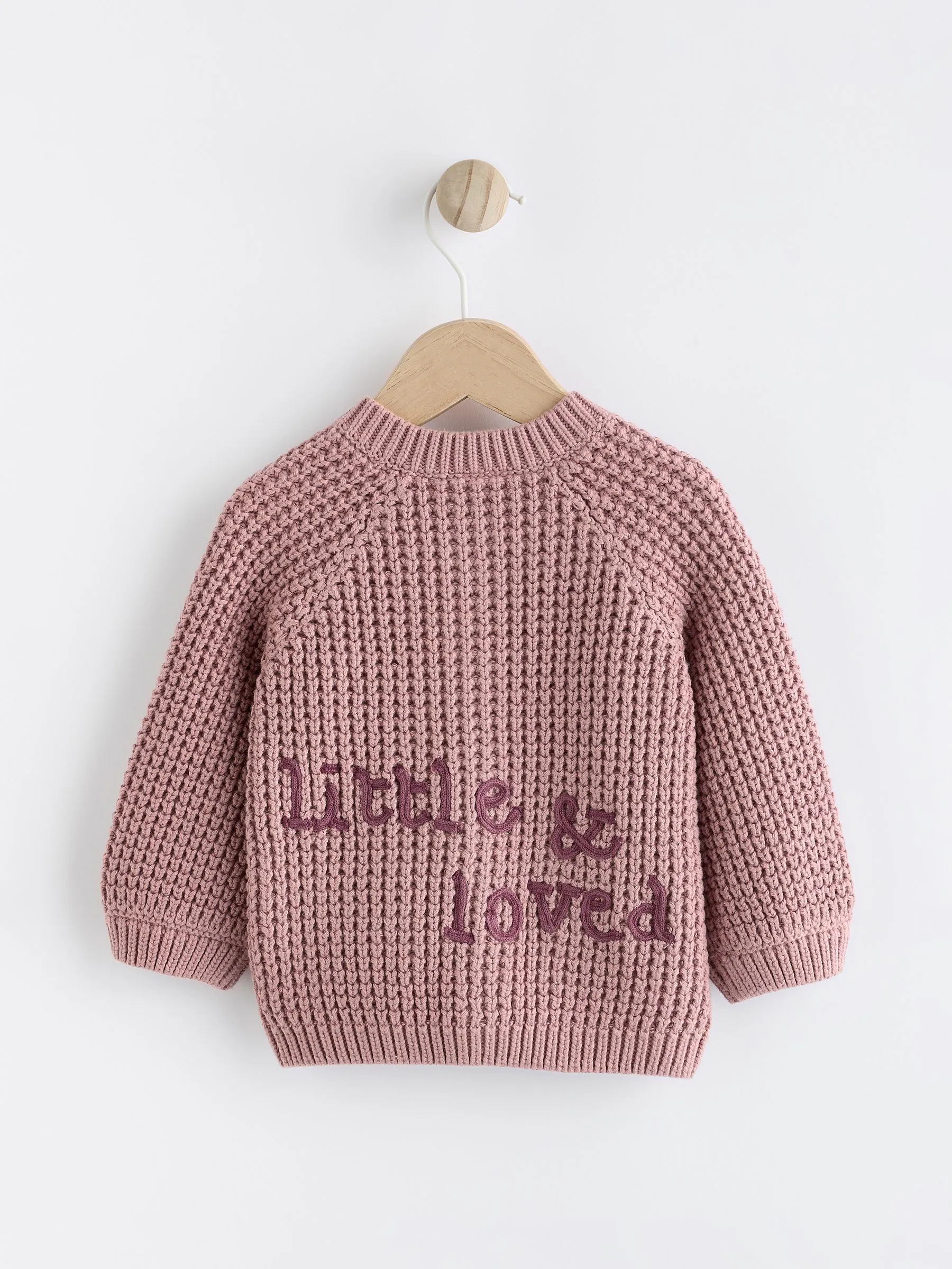Roze - Gebreid babyvestje met geborduurde slogan op de rug (0mnd-2jr)