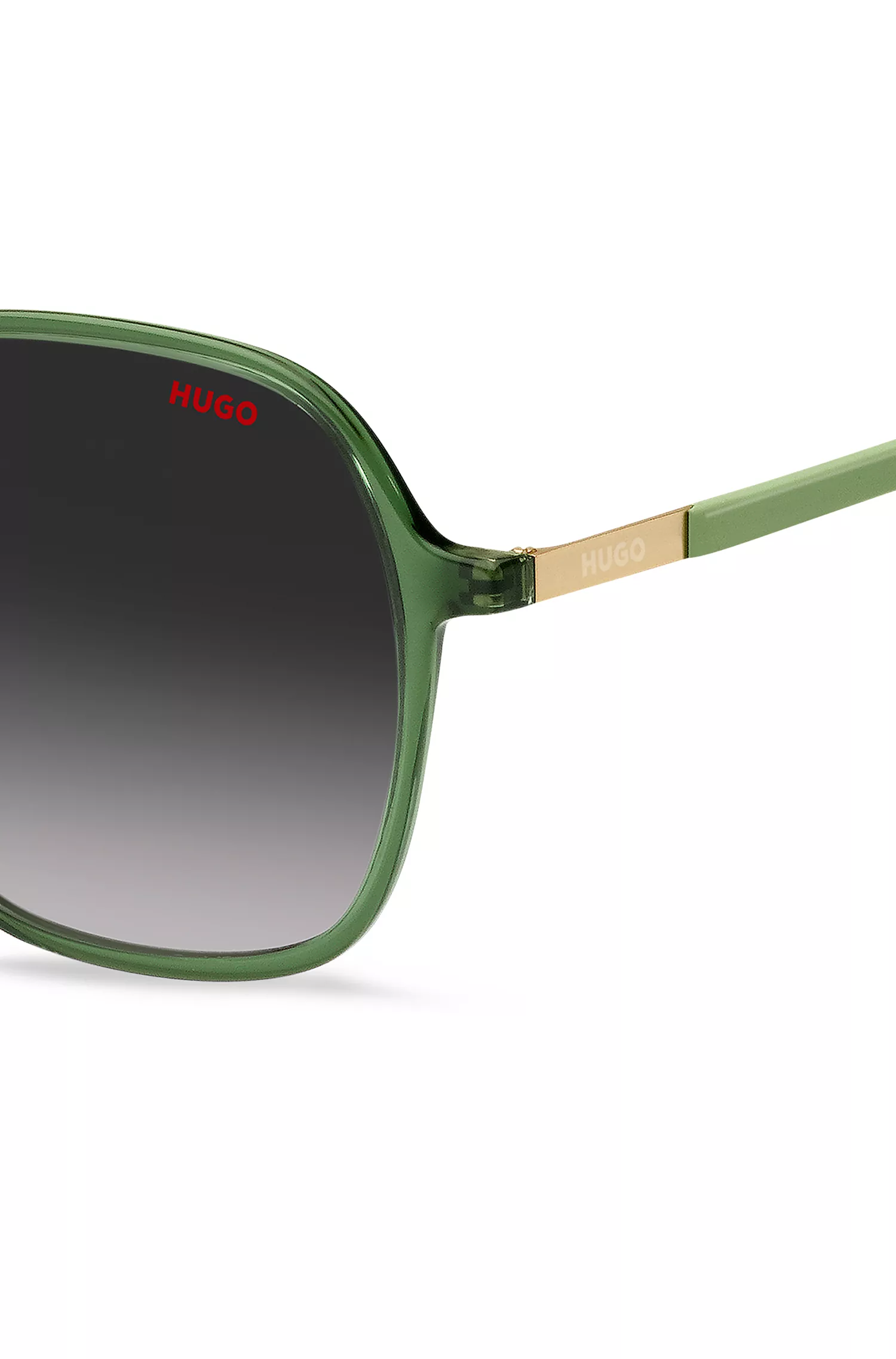 Óculos de sol HUGO vermelho-verde com hastes de aço inoxidável.