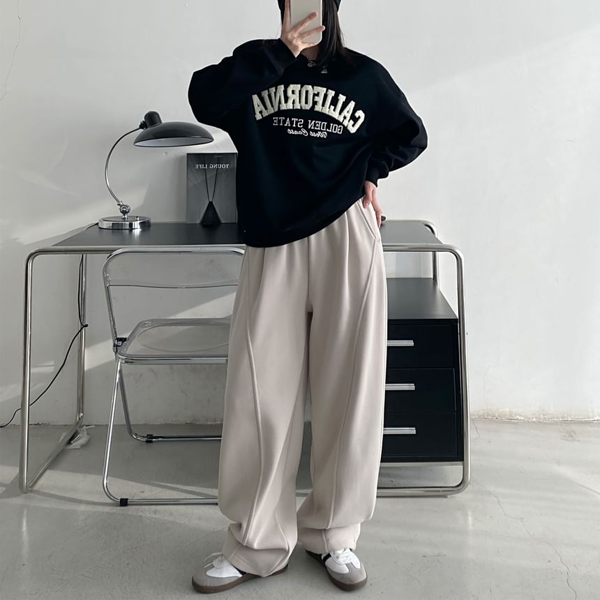Cossita - Effen fleecegevoerde joggingbroek met elastische taille en wijde pijpen