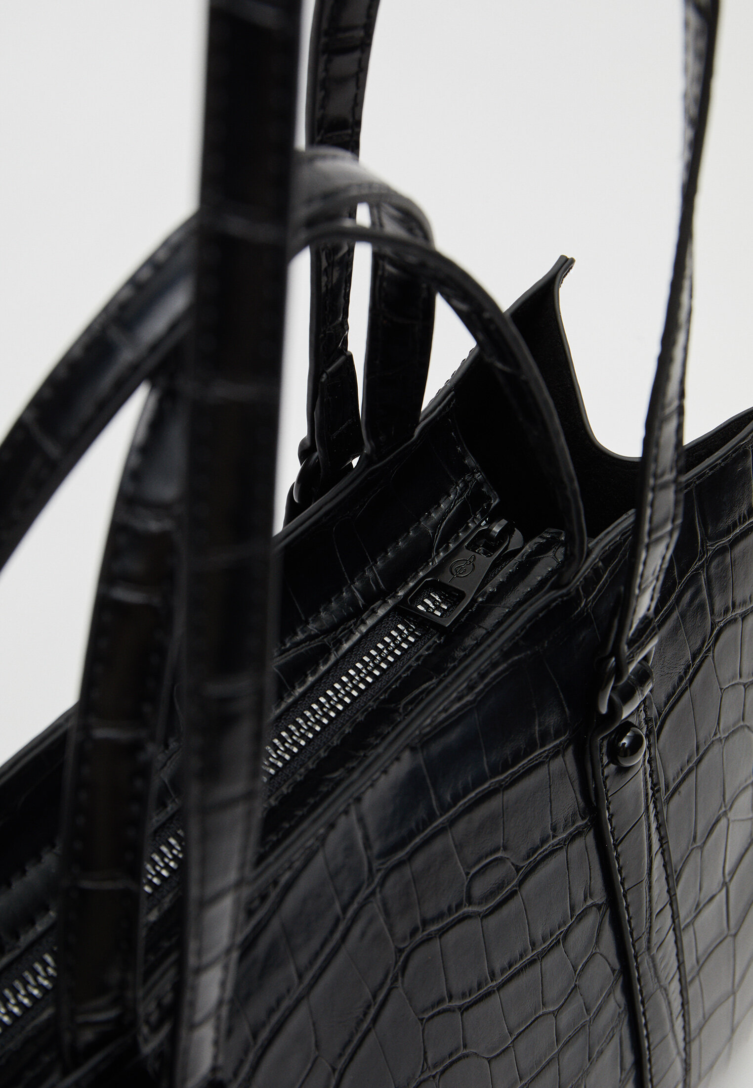 Bolsa de tecido imitando crocodilo