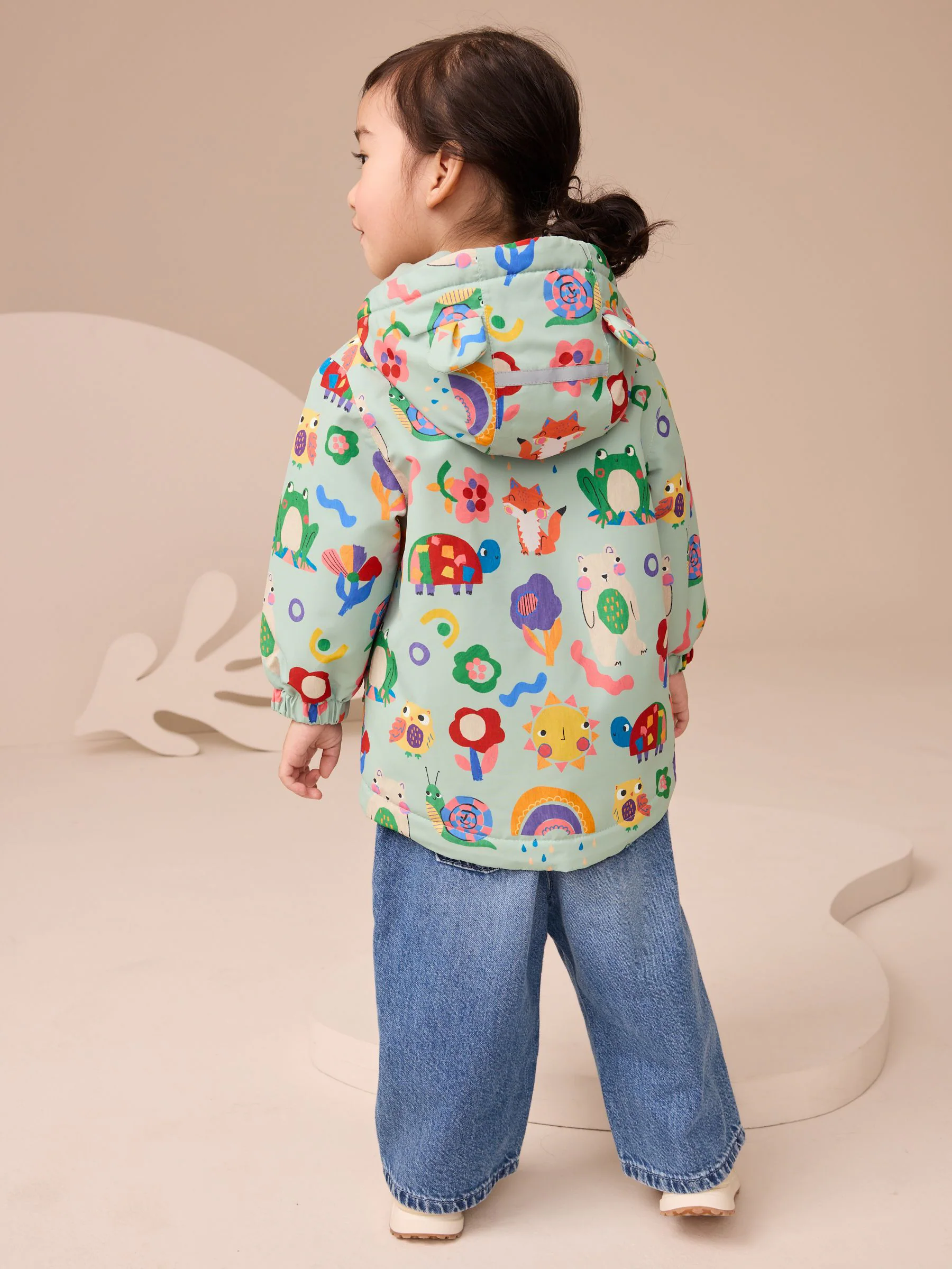 Groen met figuurtjes - Waterdicht jack (3 mnd-7 jr)