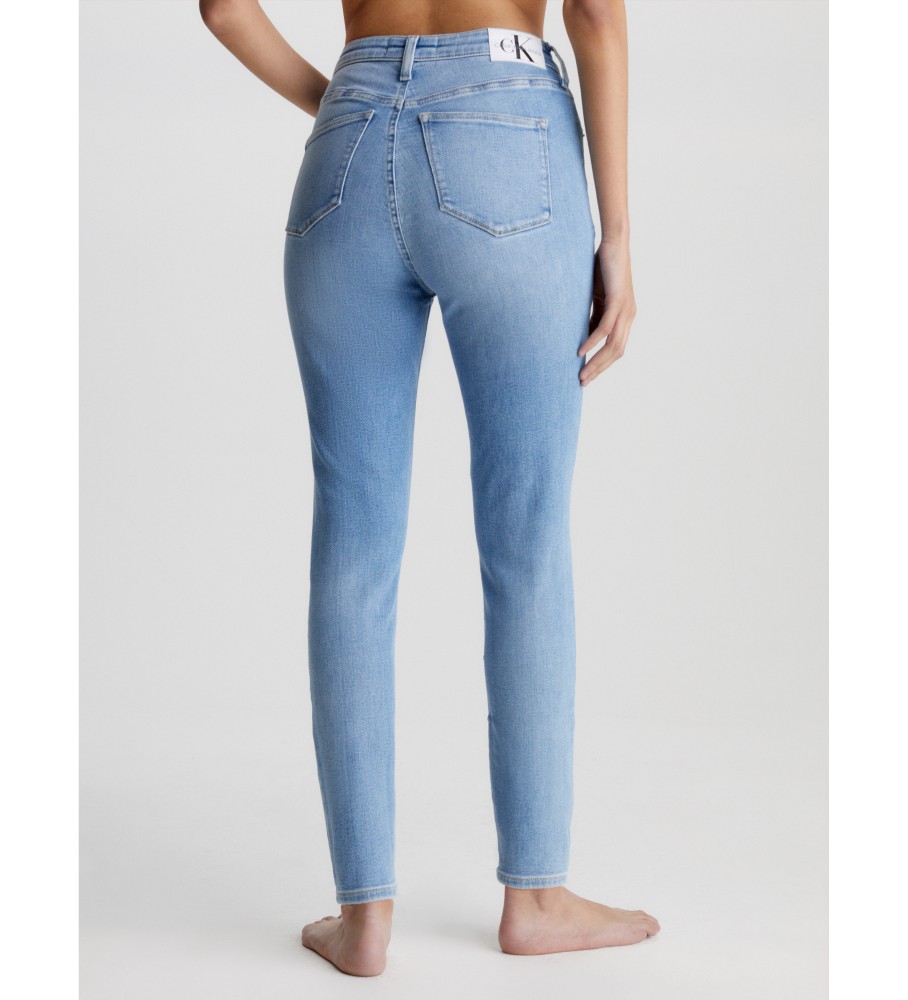 Calça jeans Calvin Klein de cintura alta super skinny até o tornozelo azul