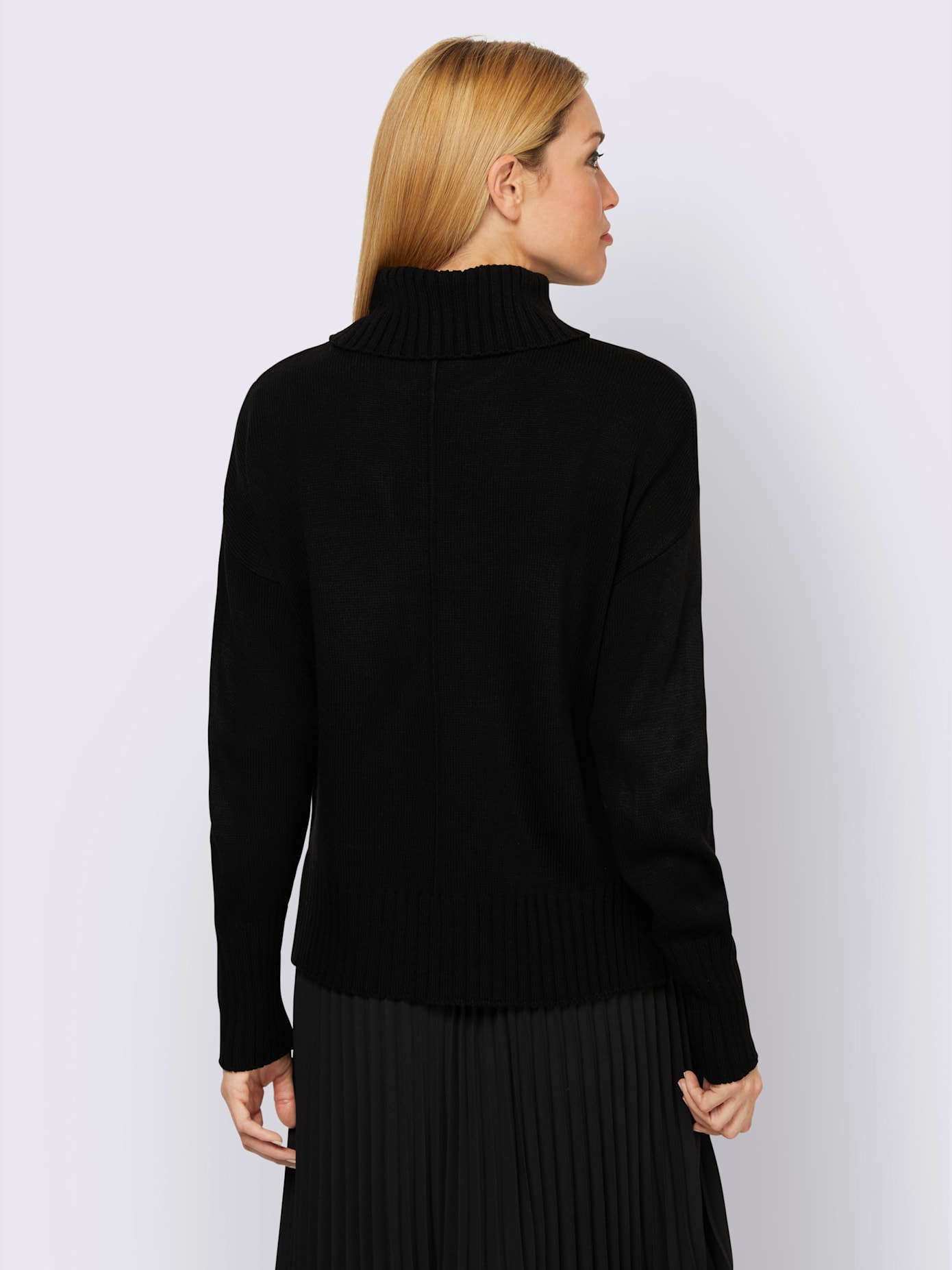 Pull col roulé flatteur