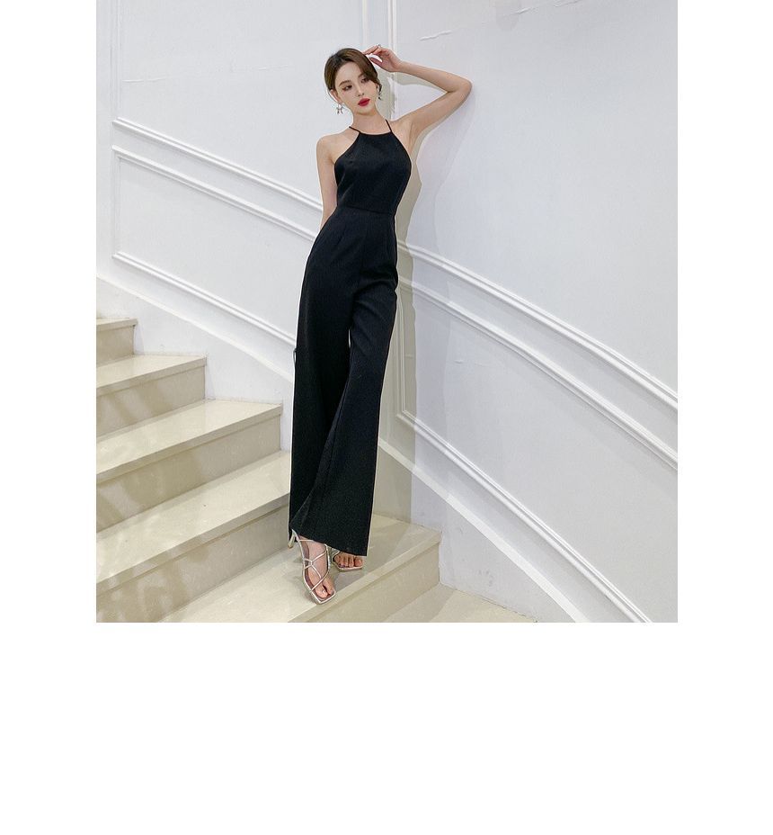 Juanita - Halter-hals jumpsuit met open rug en wijde pijpen
