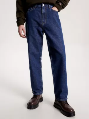 Calça jeans estilo skatista, modelagem ampla, ideal para trabalho.