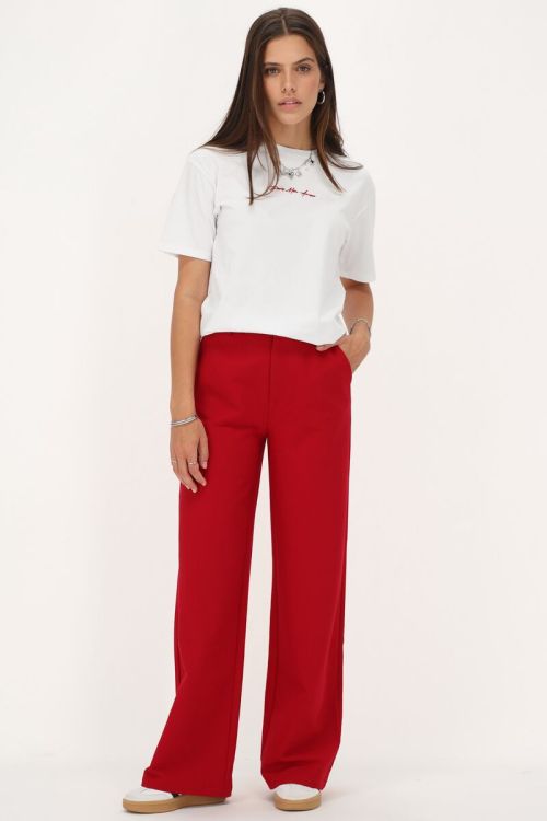 Rode pantalon met blinde knoop
