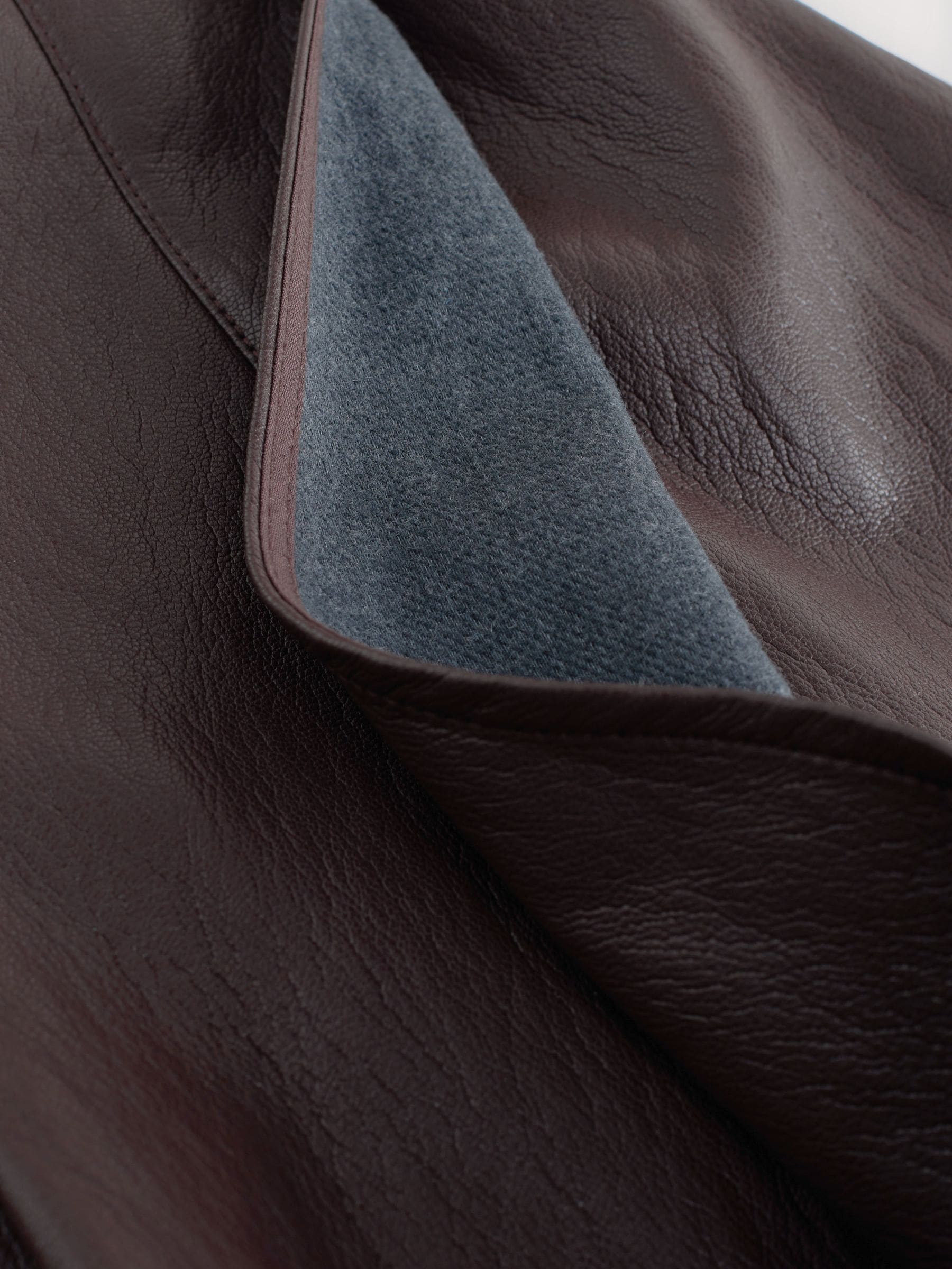 Nothing Ordinary Faux Leather Wrap Midi Kilt Skirt